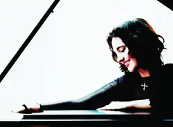 Parodi with her 1928 Steinway B which was destroyed in the 2025 Los Angeles widfire