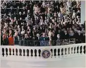 At his inauguration, Jimmy Carter takes the oath of office to succeed Gerald Ford as president. Betty Ford stands in the lower-left corner of this image.