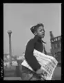 Newsboy selling The Chicago Defender, 1942
